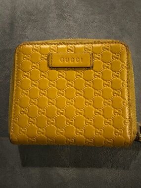 Gucci Made in Italy Embossed GG Zip Around Wallet in Mustard Yellow Leather